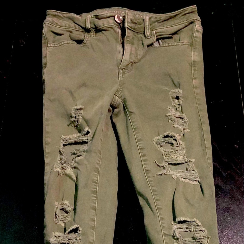 Army green ripped jeans
